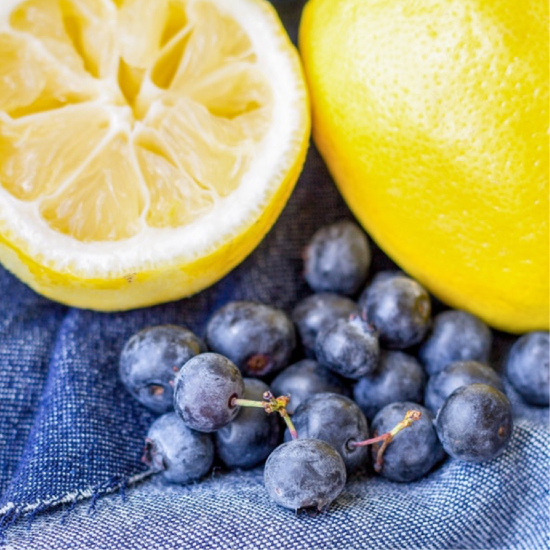 a picture of lemons and blueberryies